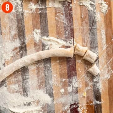 Rolled dough into a long thin rope.