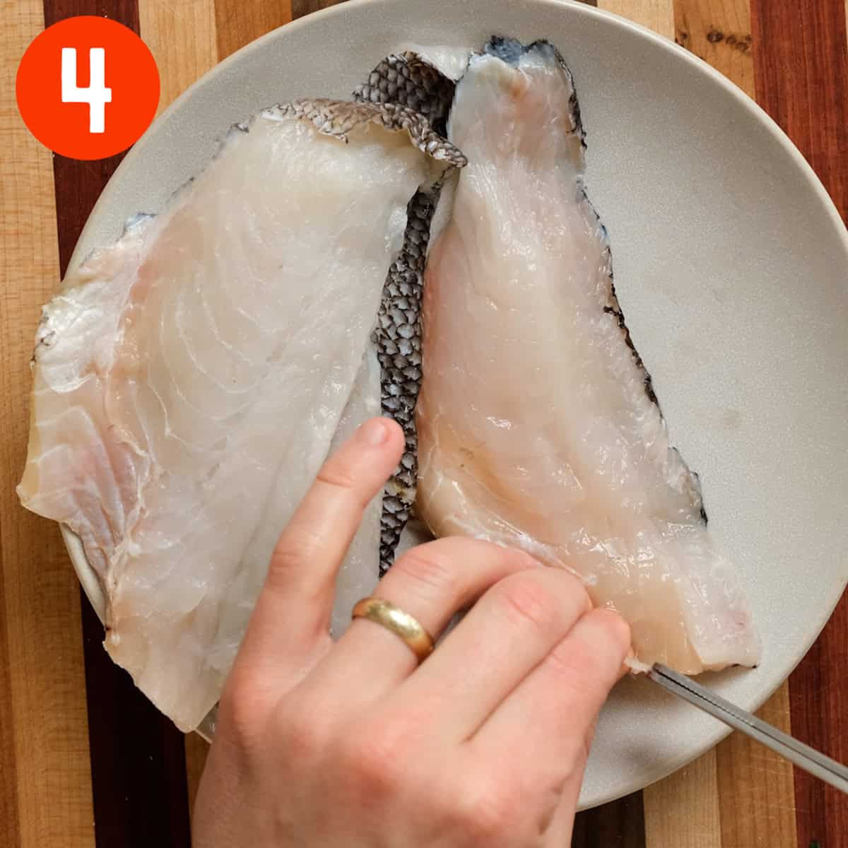 Deboning sea bass.