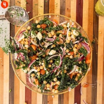 Mixing dressing with vegetables.