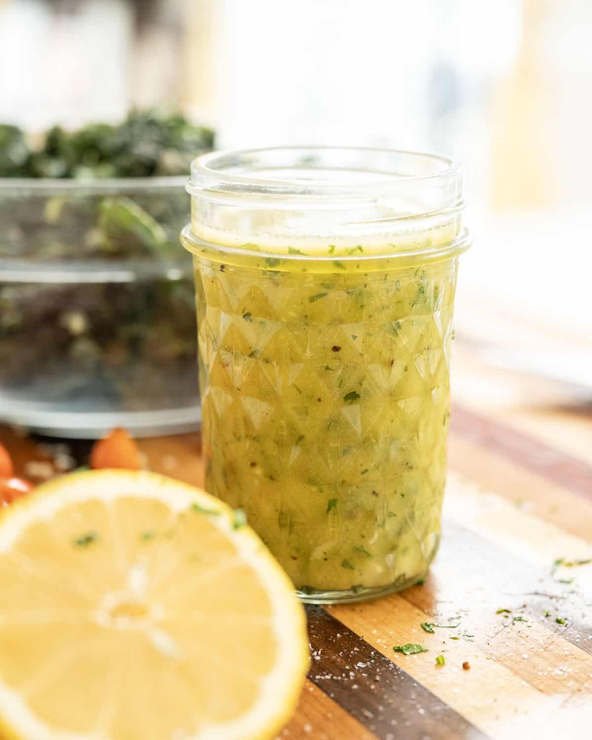 Lemon garlic vinaigrette in a mason jar.