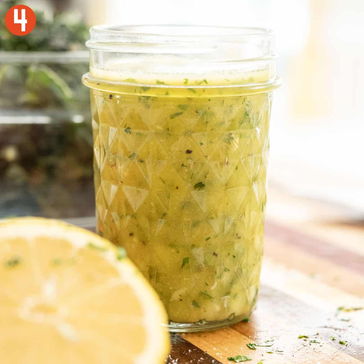Dressing combined in a mason jar.