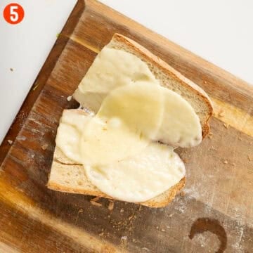 Toasting Italian bread with provolone.