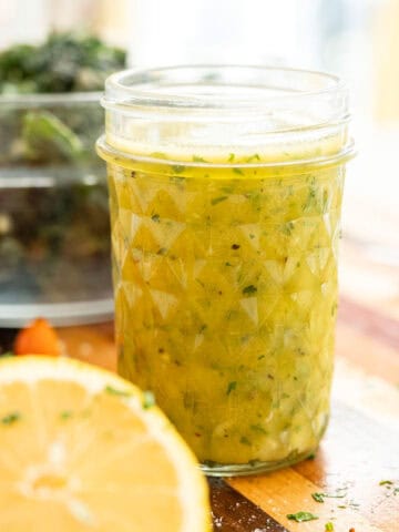 Lemon garlic vinaigrette in a mason jar.