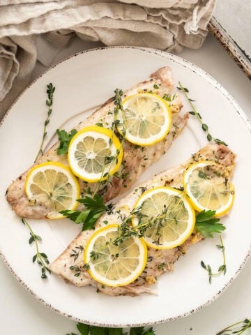 Baked red snapper topped with lemon and thyme.