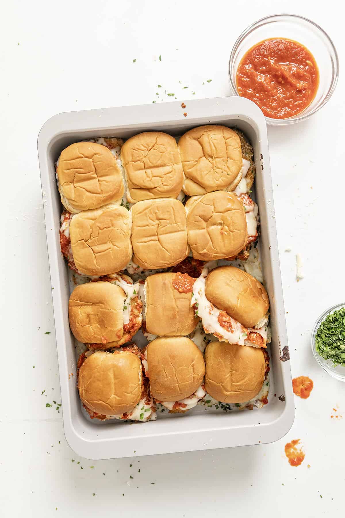 Chicken parm sliders in a tray.