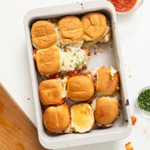 Chicken parm sliders in a tray.
