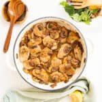 Pork tenderloin medallions in marsala sauce in a braiser.