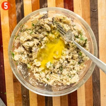 Combining egg with eggplant mixture.