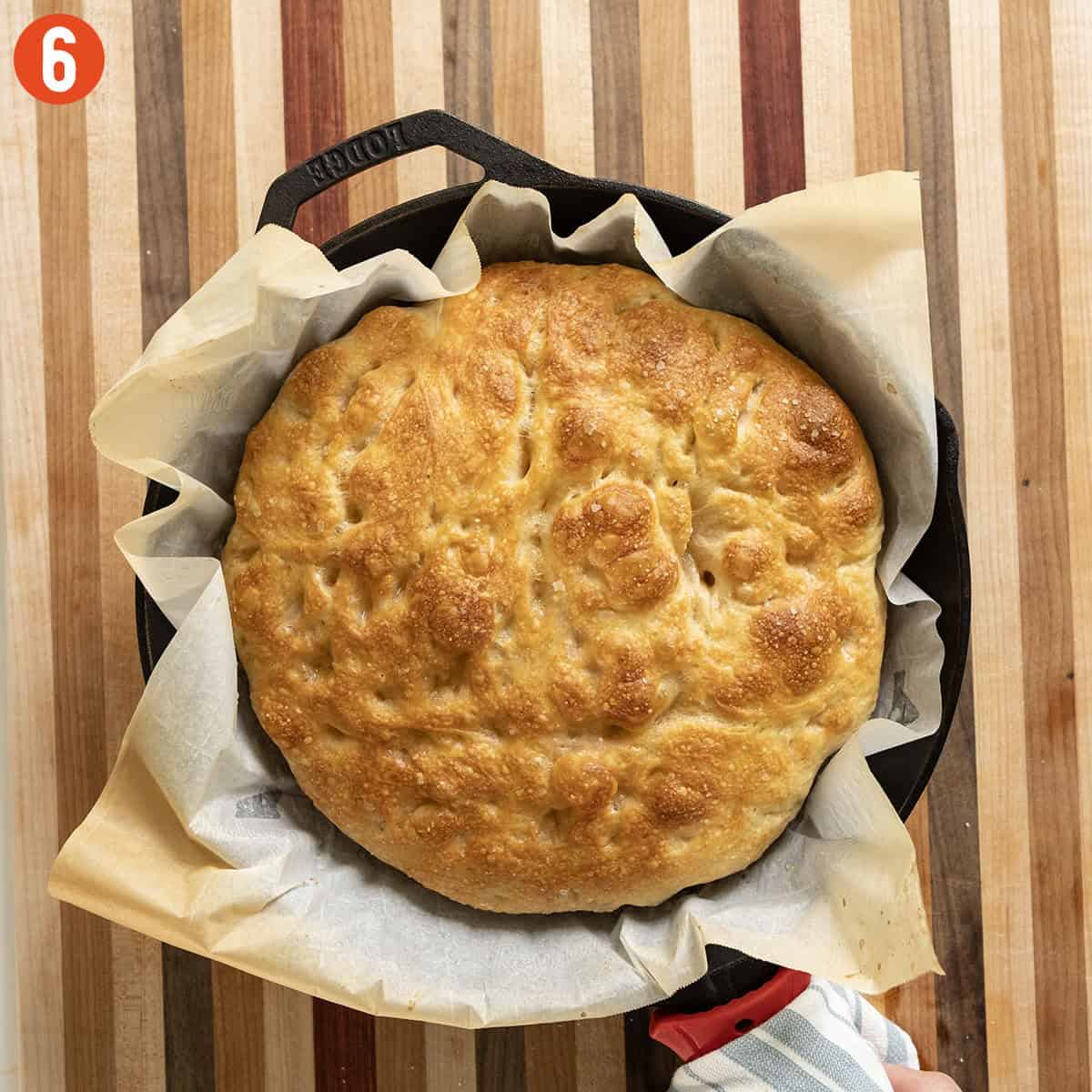 Baked focaccia bread in a cast iron.