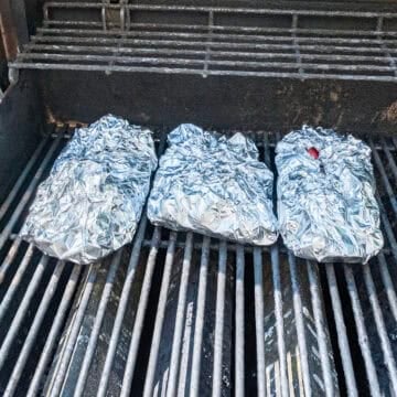 Foil packets on the grill.
