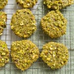Italian pistachio cookies on a cooling rack.