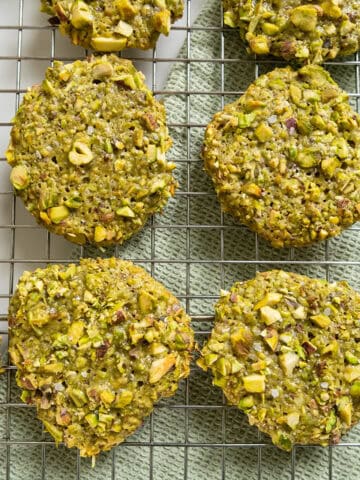 Italian pistachio cookies on a cooling rack.