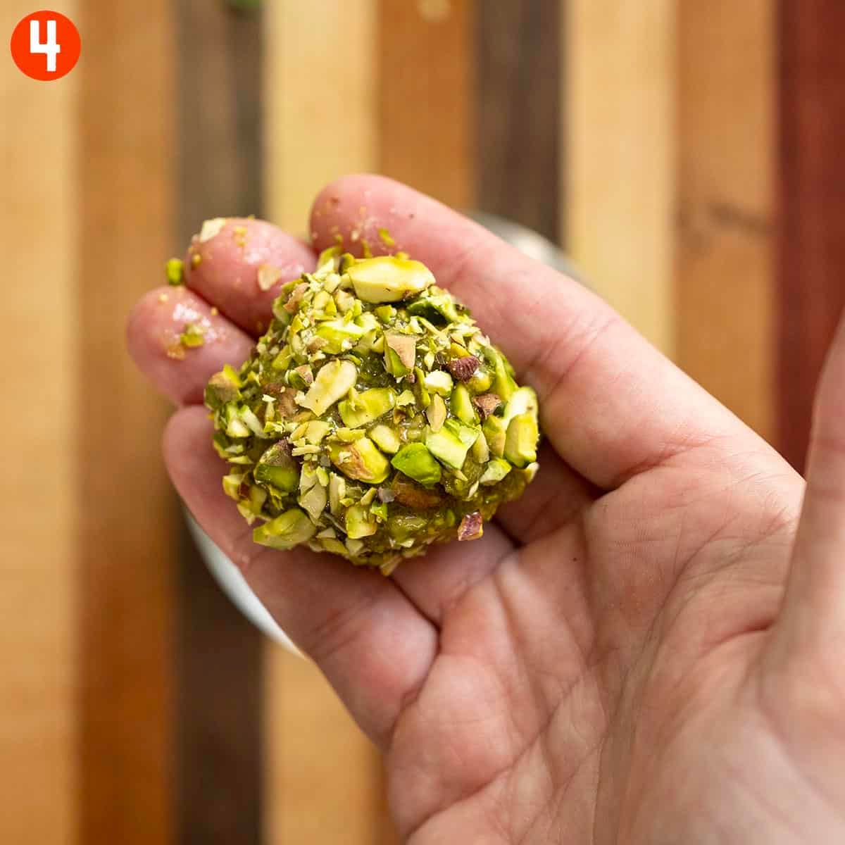 Rolled pistachio dough rolled in chopped pistachio.