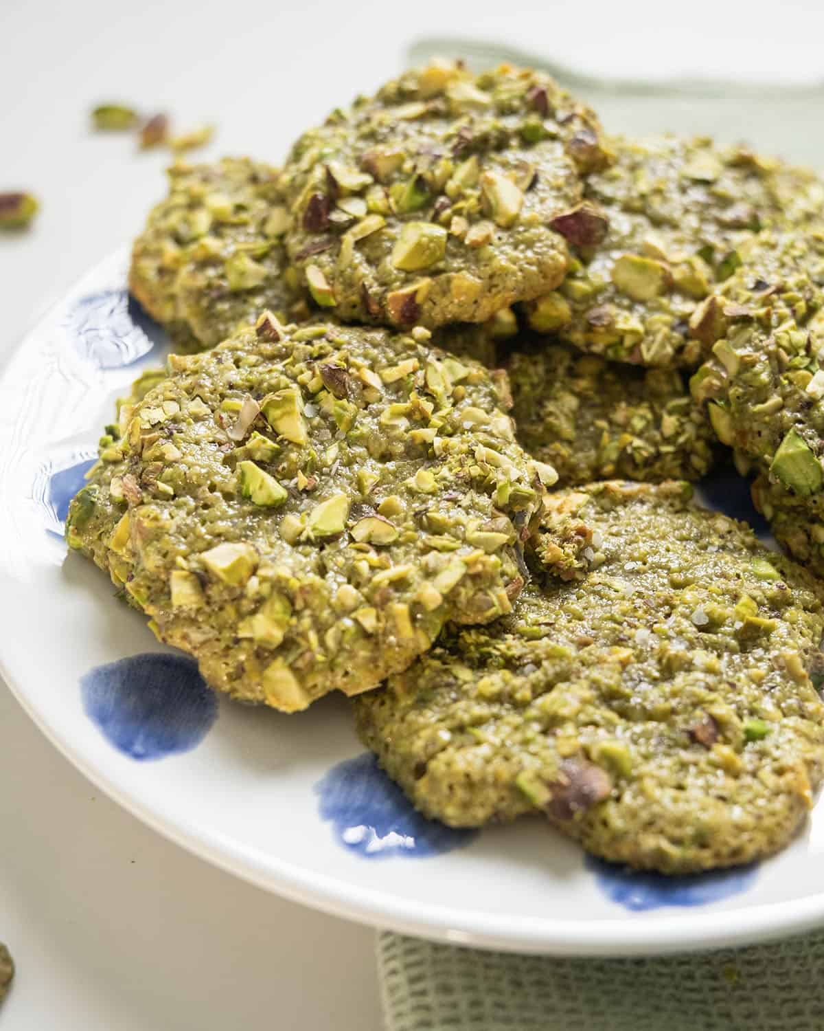 Italian pistachio cookies on a plate.