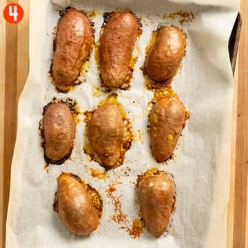 Sweet potatoes roasted on a sheet pan.