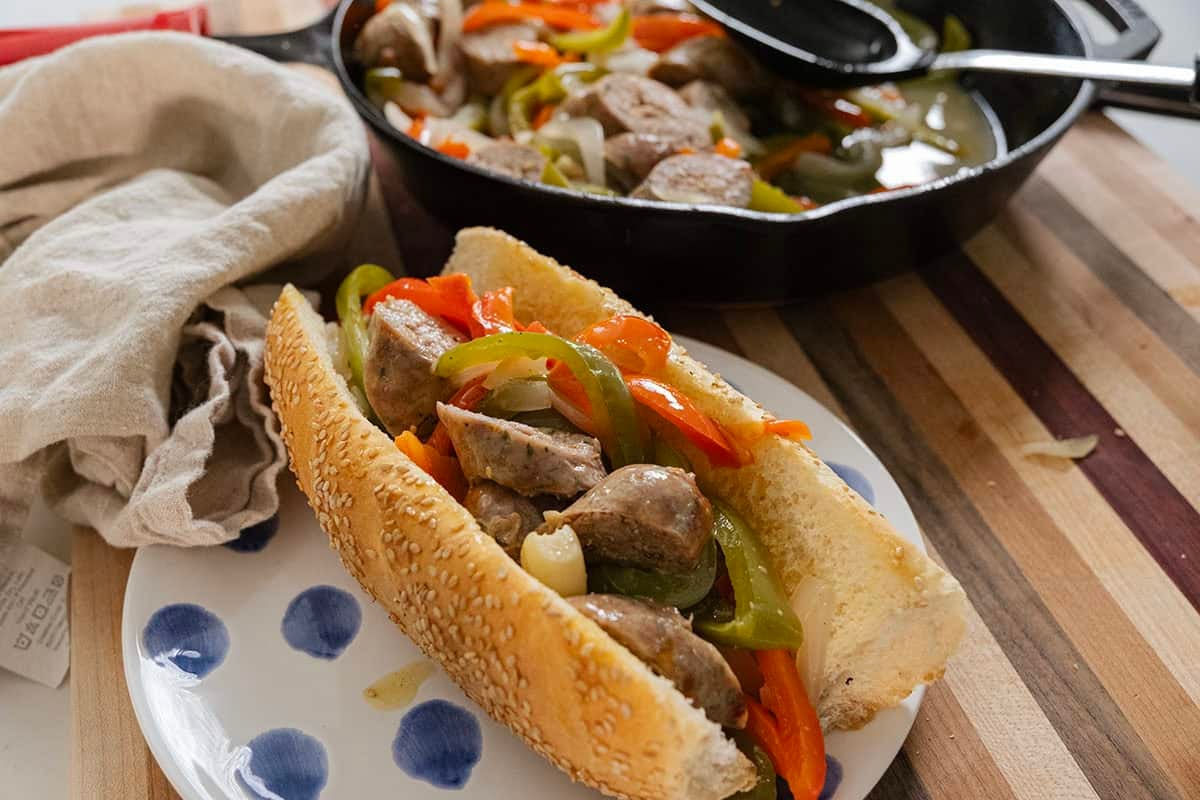 Sausage and peppers on a roll.