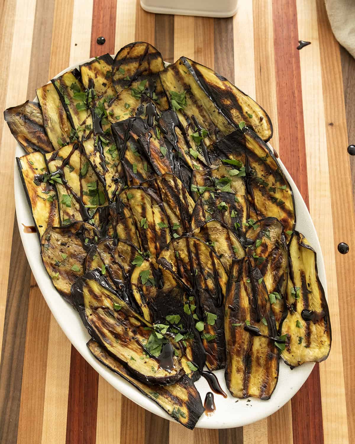 Grilled Italian eggplant drizzled with balsamic glaze.