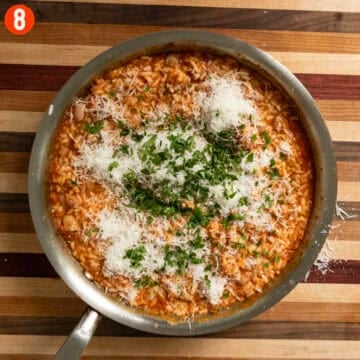 Combining parmesan and parsley with the rice and beans.