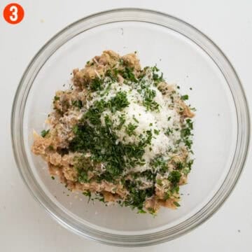 Combining browned sausage in a bowl with parmigiano, garlic, and parsley.