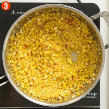 Toasting orzo in saucepan.