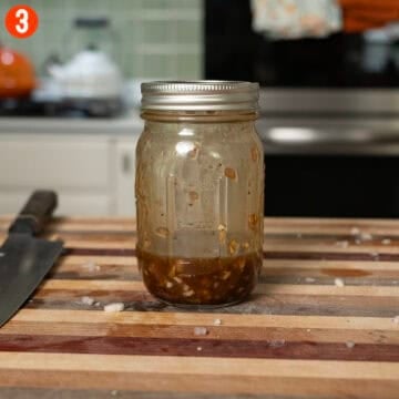 Balsamic vinaigrette in a mason jar.