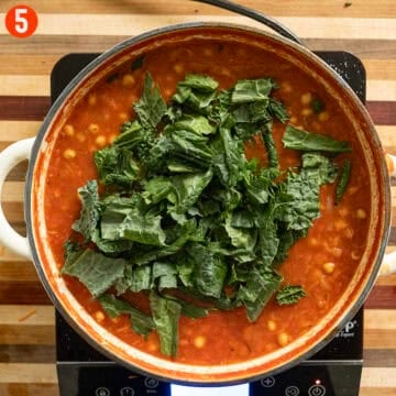 Kale added to the pot to wilt.