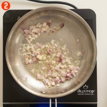Sauteing shallots in butter.