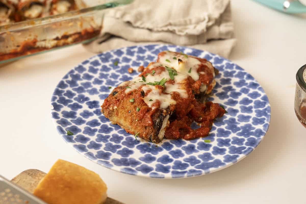 Eggplant Rollatini on a plate with melted mozzarella.