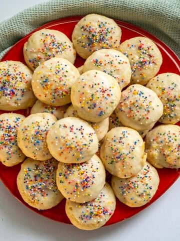 Italian lemon ricotta cookies on a plate.
