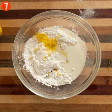 Icing ingredients combined in a bowl.