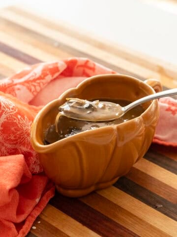 Mushroom marsala gravy in a gravy boat.